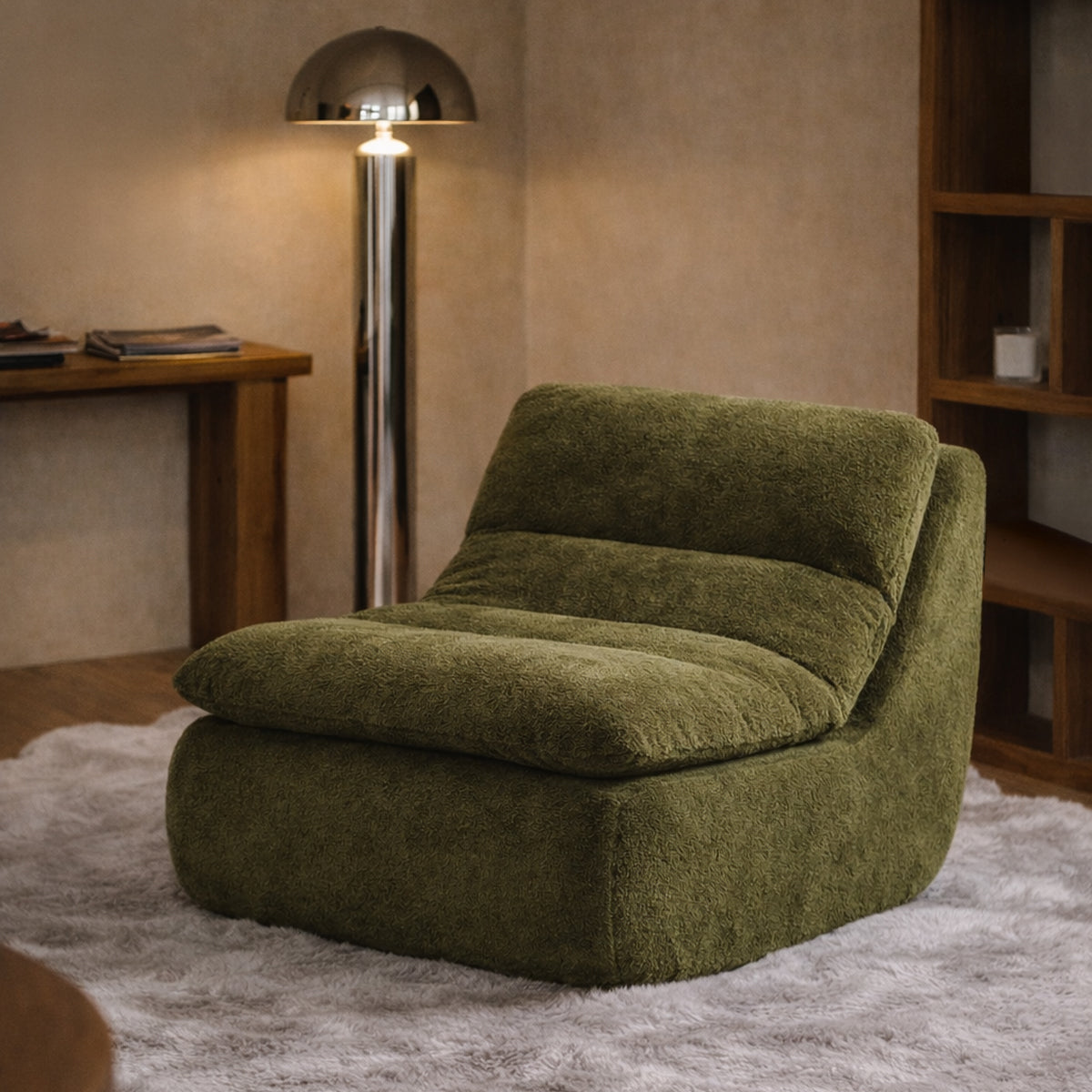 Olive green faux fur large rug under a low lounge chair