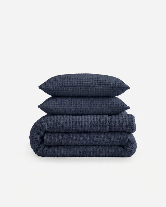 Waffle comforter set, midnight blue comforter with two folded shams