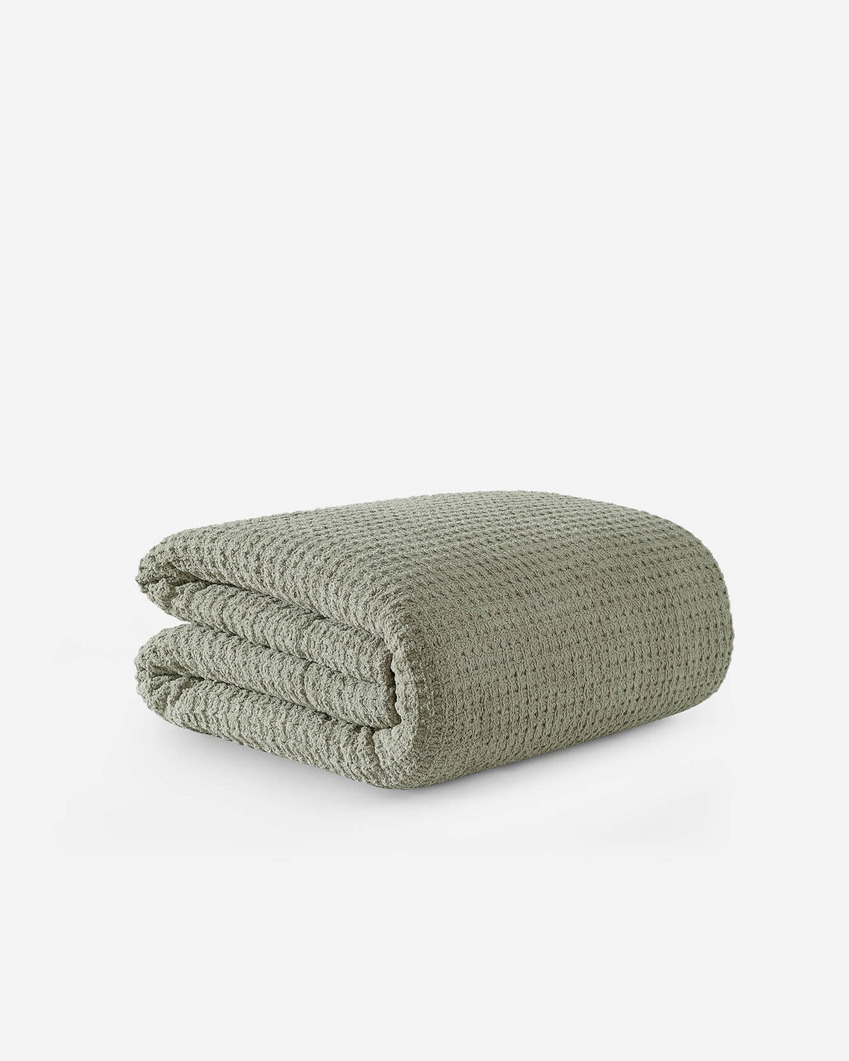 Folded waffle comforter, sage-green textured fabric