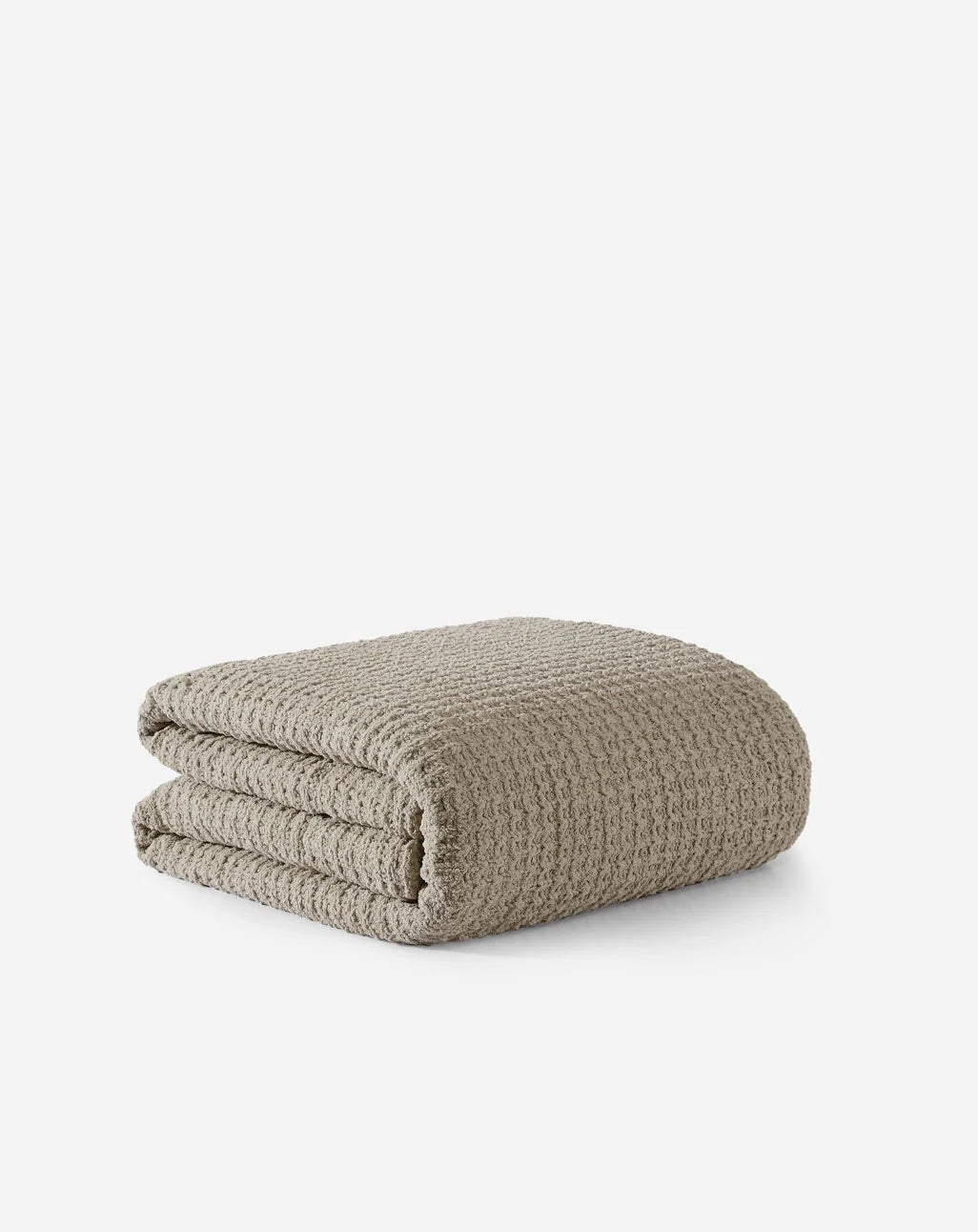 Folded waffle comforter, light taupe textured fabric