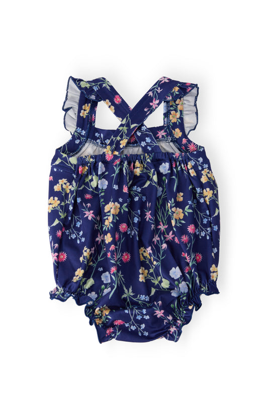 Floral cross-back romper with ruffle shoulder straps and navy print