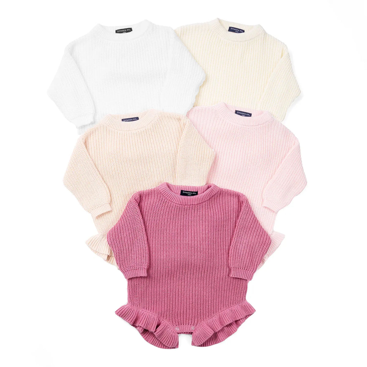 Chunky knit baby rompers in multiple colors, with ruffle hem and snaps