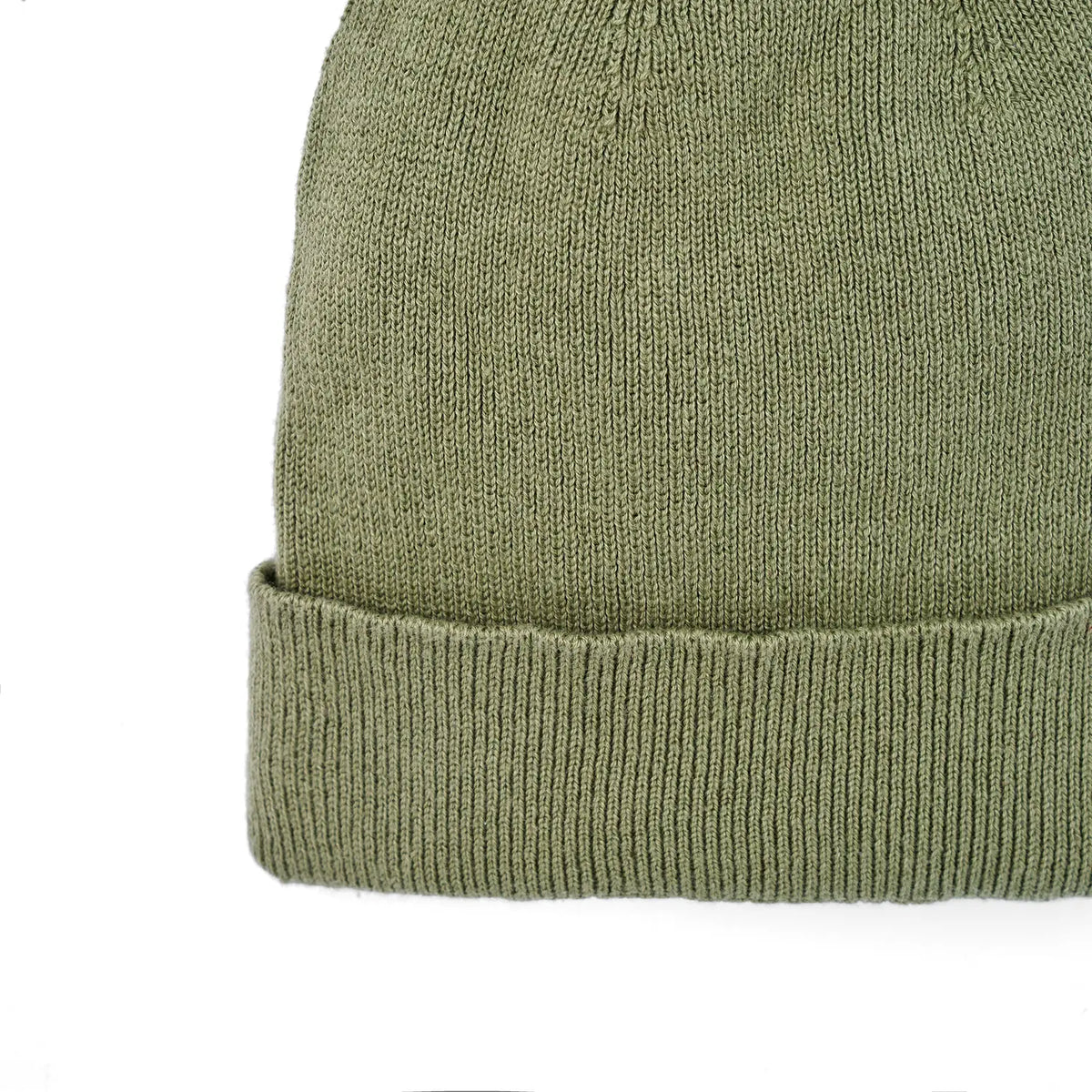 Sage green knit baby beanie with ribbed cuff and smooth knit crown.