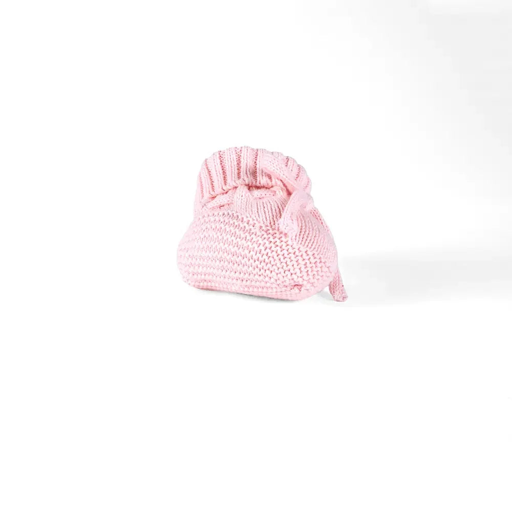 Pink knitted baby bootie with ribbed cuff and tie bow, single shown