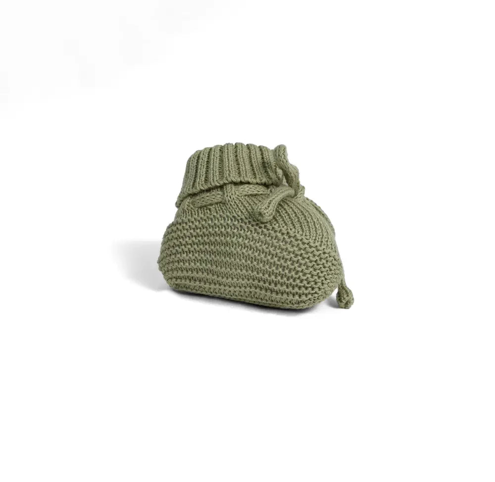 Sage green knitted baby bootie with ribbed cuff and bow tie, single