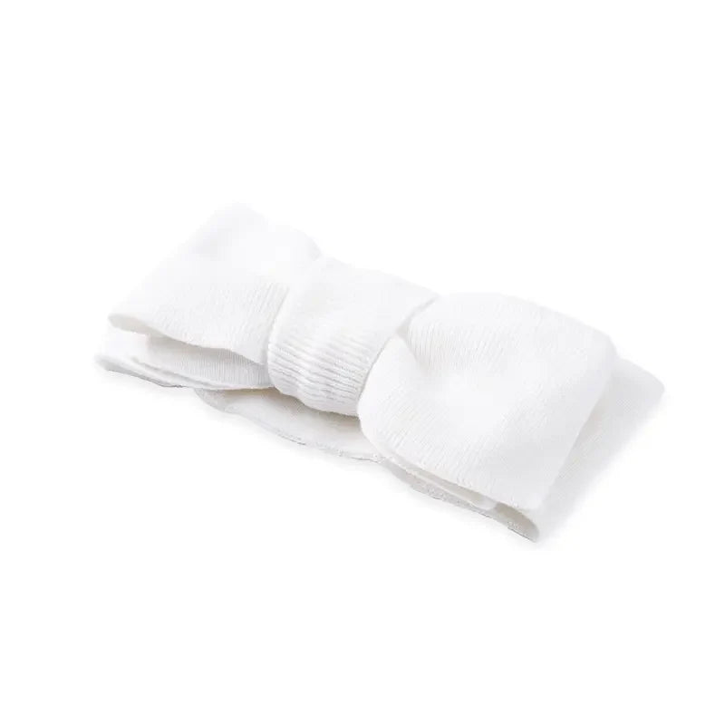 White knitted topknot bow with oversized bow ends and layered knot