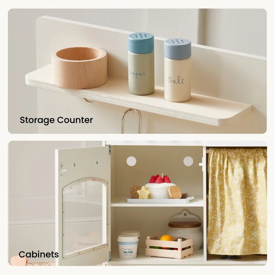 White play kitchen details: storage shelf with shakers and open cabinets with play food