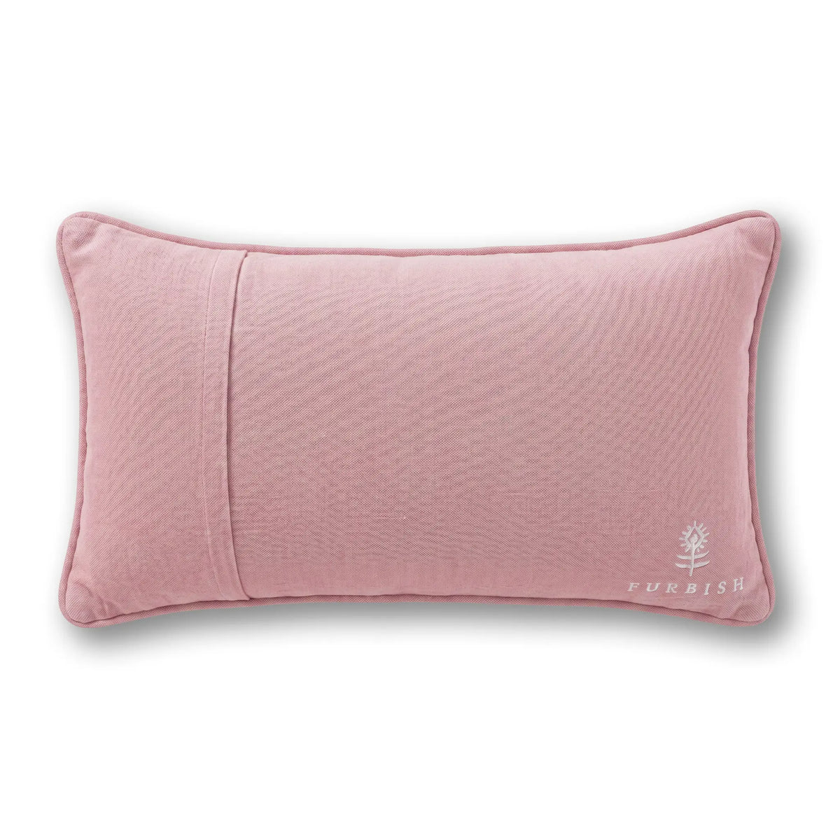Blush pink solid lumbar pillow with subtle quilted texture and small embroidered logo corner