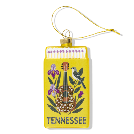 Yellow Tennessee matchbook ornament with bird-and-floral design, hanging loop