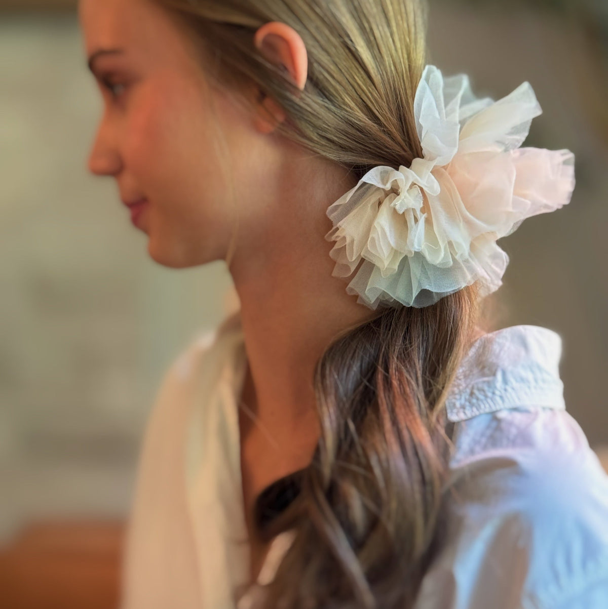 Tutu bear bag charm worn in hair with ruffled white tutu and pearl detail