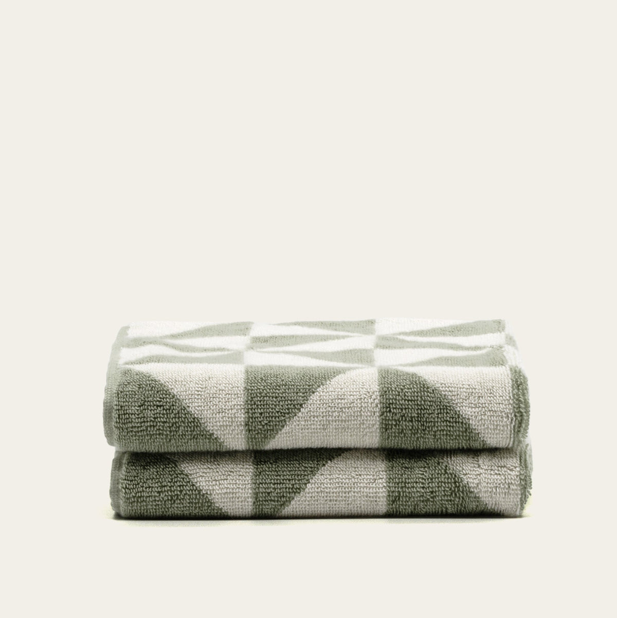 Sage green and ecru geometric check cotton towel set, folded stack
