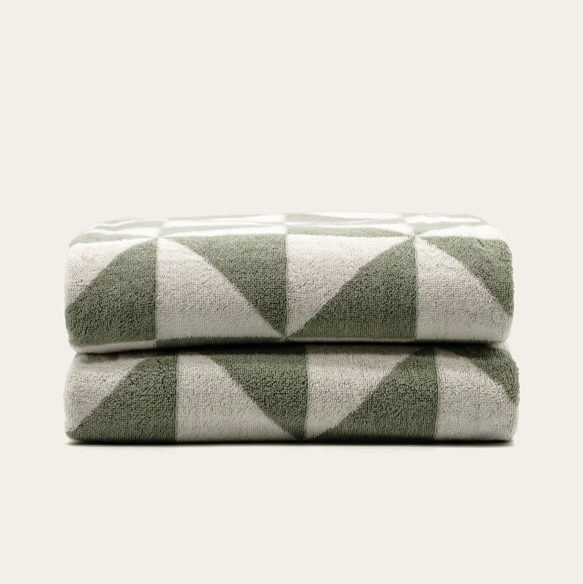 Sage green and ecru checkered cotton towels, folded stack
