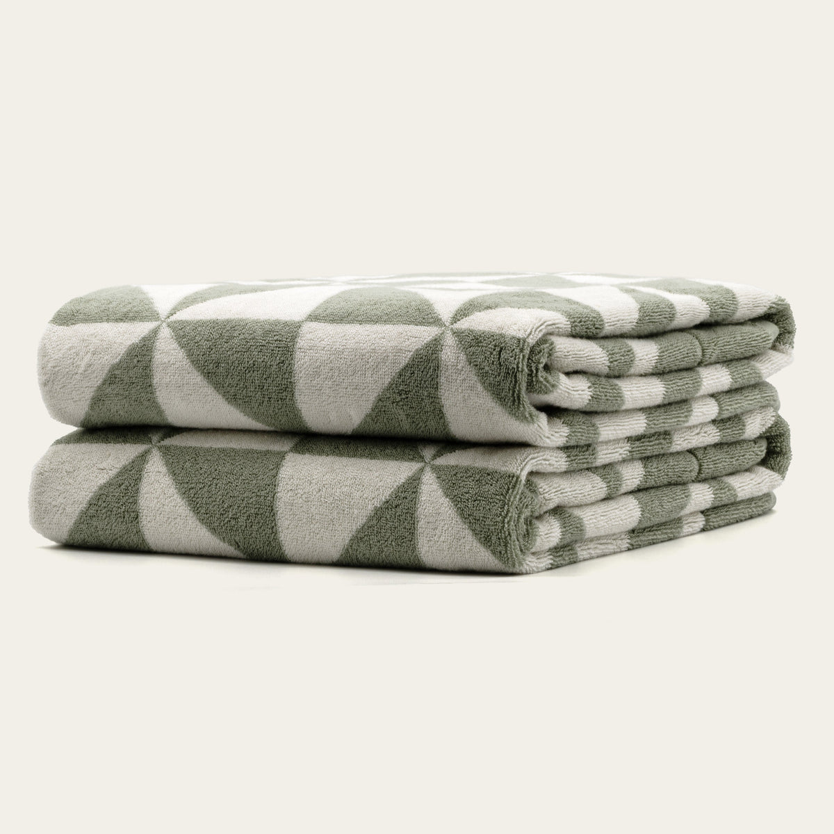 Sage green and ecru geometric check cotton towels, folded stack