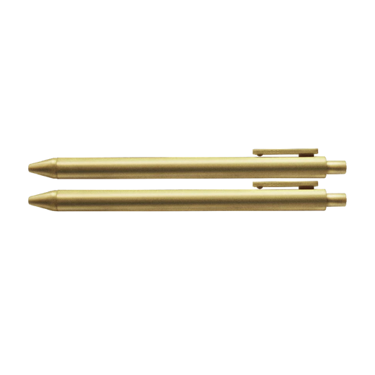 Gold metal ballpoint pen with side clip and capped tip