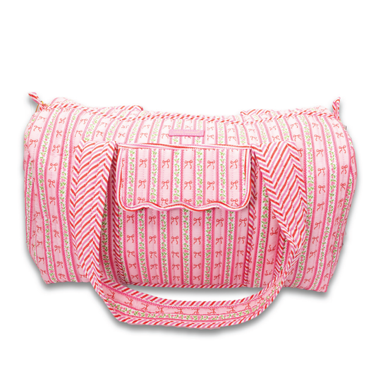 Pink quilted duffle bag with striped anchor print and front zip pocket
