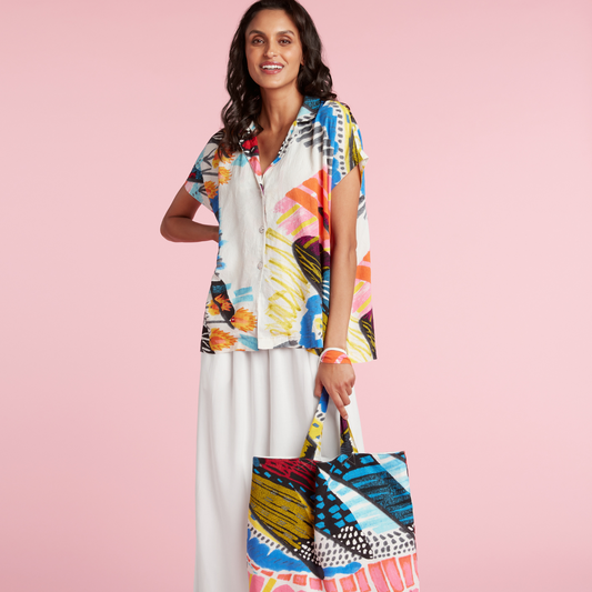 Farmers' market tote bag with colorful abstract feather print and short handles