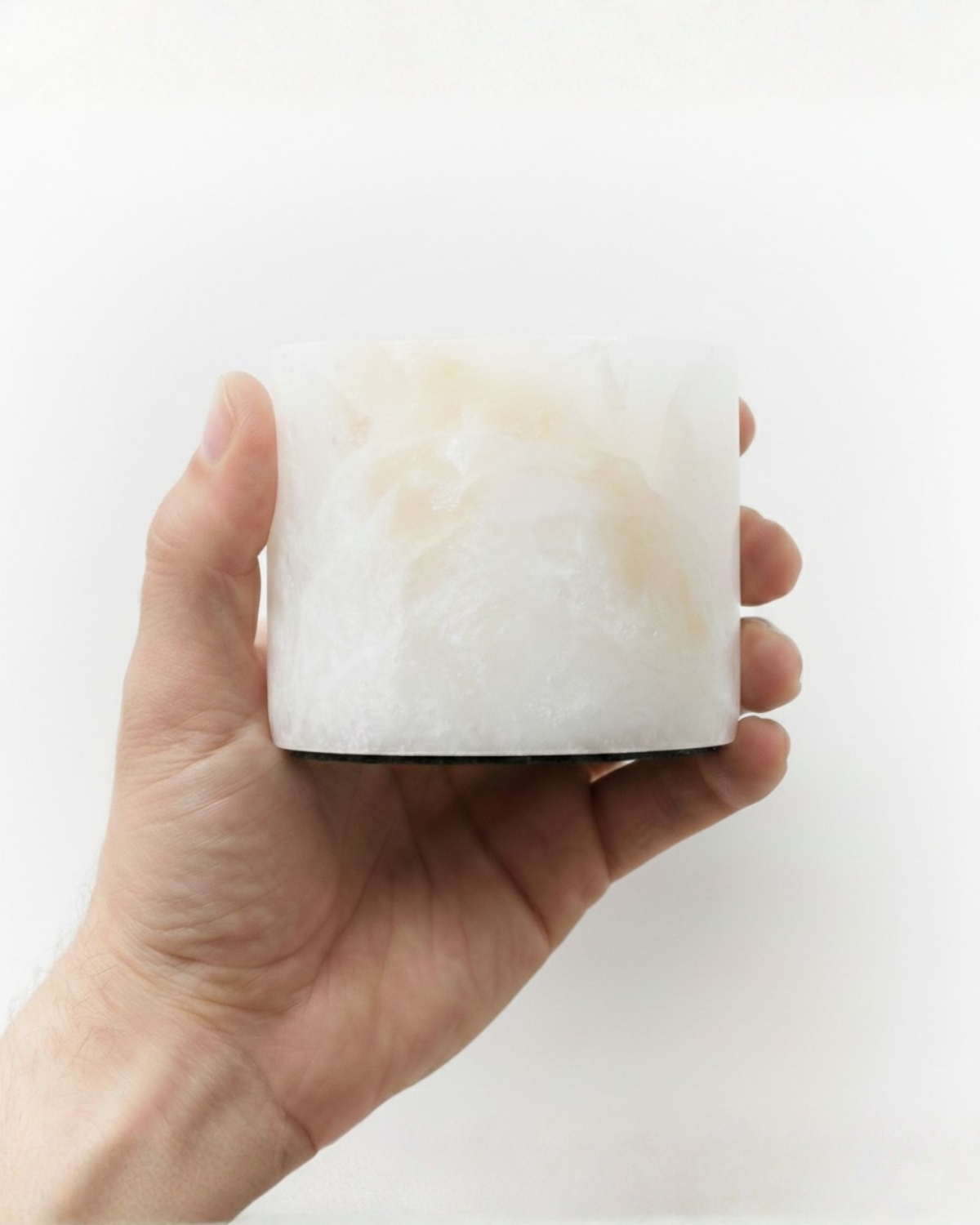 Portable lamp diffuser panel, translucent square surface held in hand