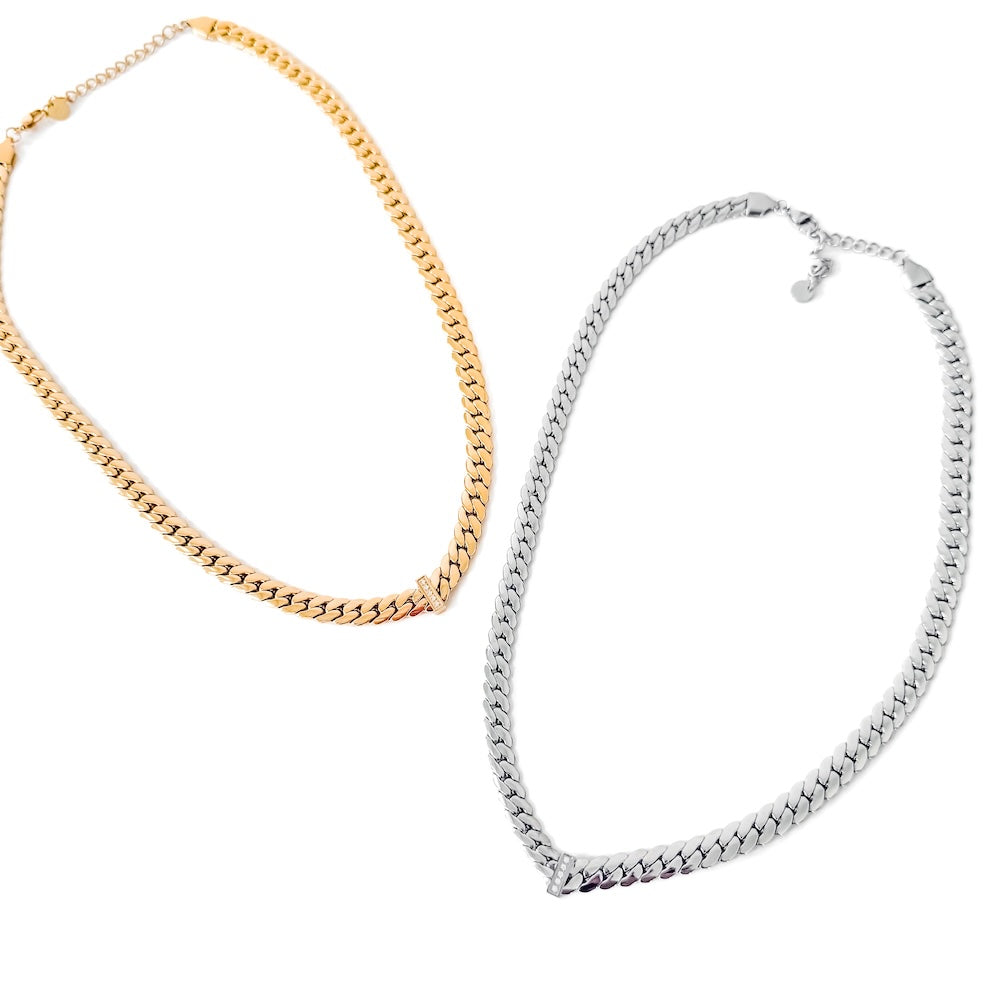 Diamond V necklace pair: gold and silver choker-style chains with V pendants