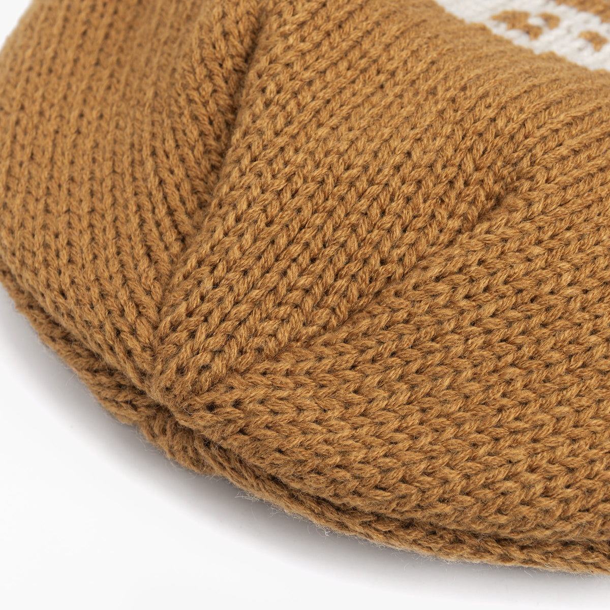 Brown knit beanie with textured stitching