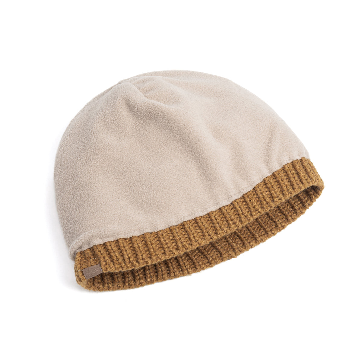 Reversible beanie with cream fleece lining and tan ribbed knit cuff