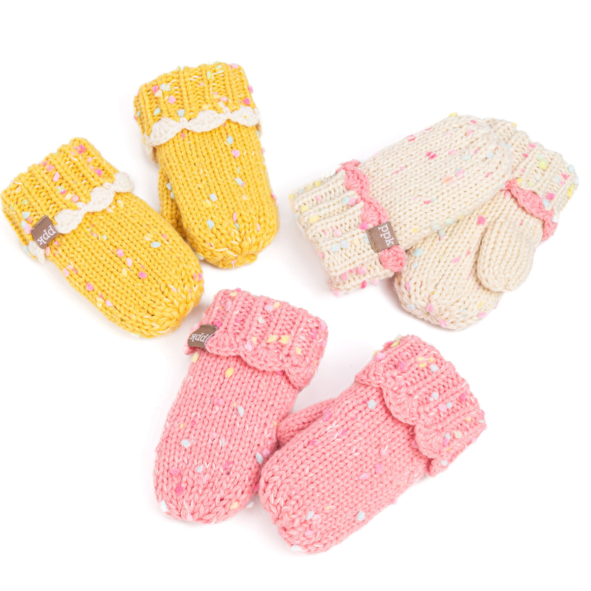 Three pairs of speckled knit mittens in yellow, off-white, and pink