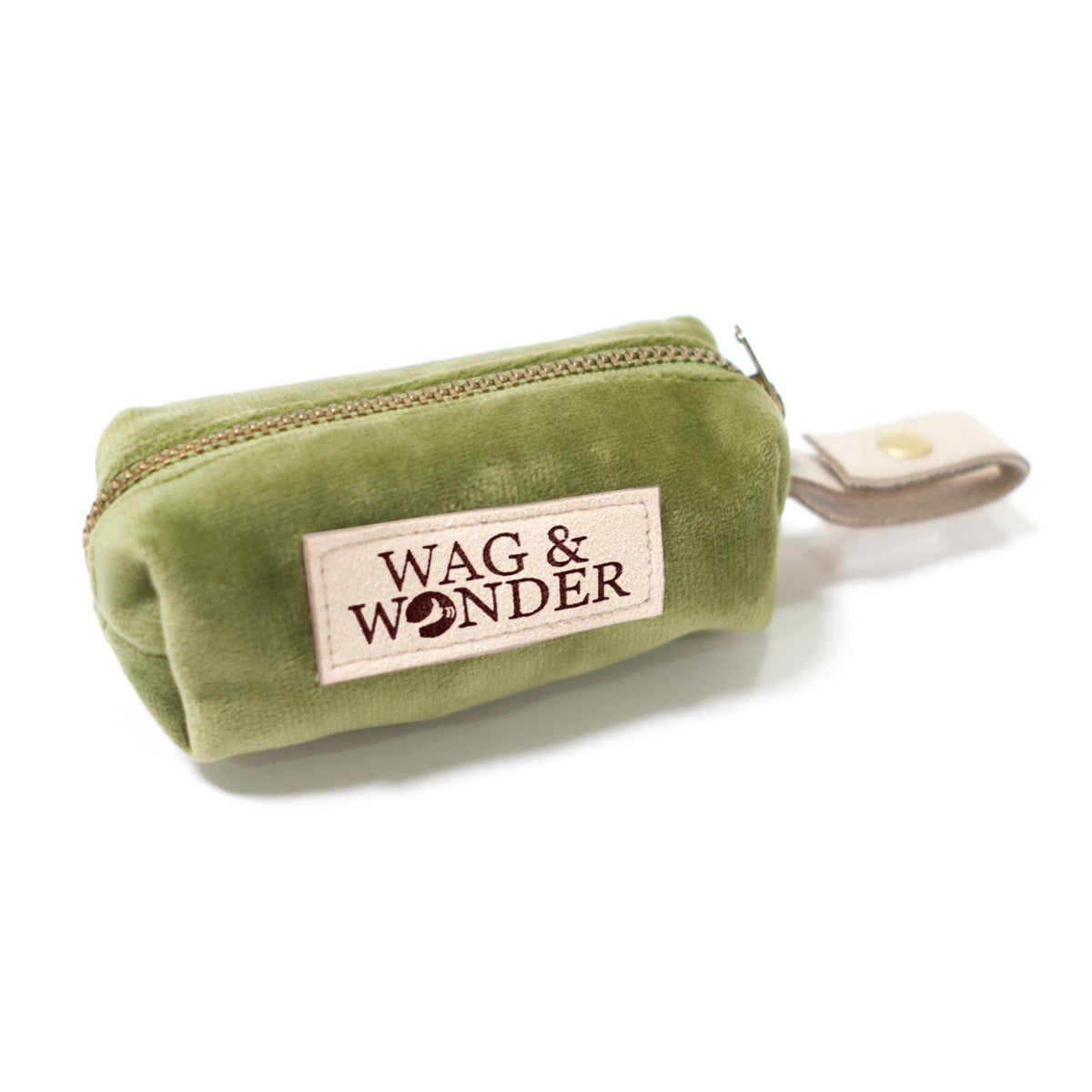 Green velvet waste bag holder pouch with zipper and WAG & WONDER logo label