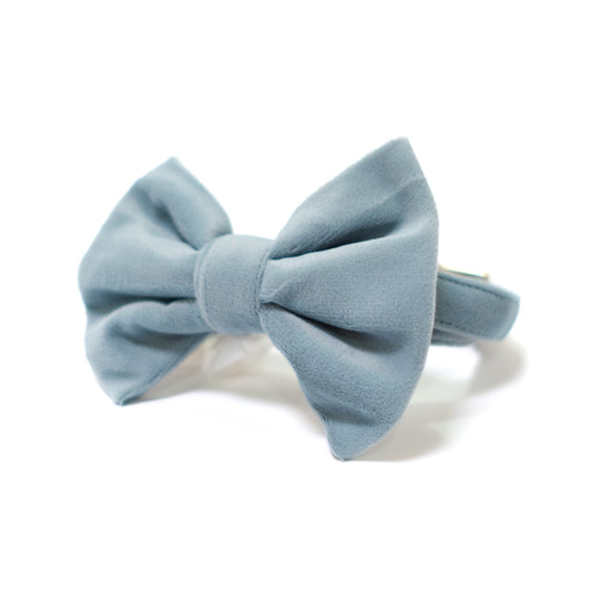 Blue velvet dog bow tie with layered folds and centered knot