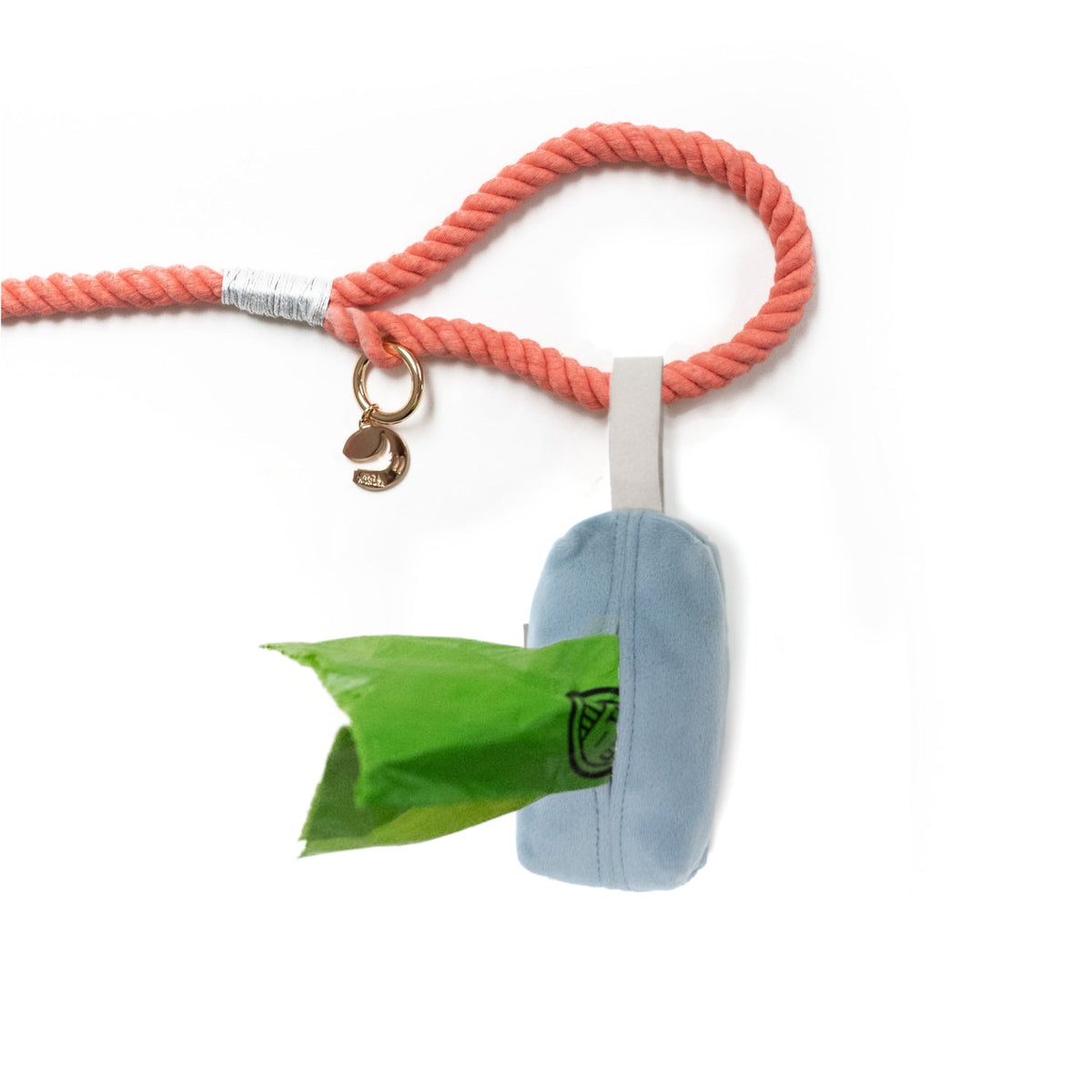Light blue velvet waste bag holder with coral rope, clip, and green bag