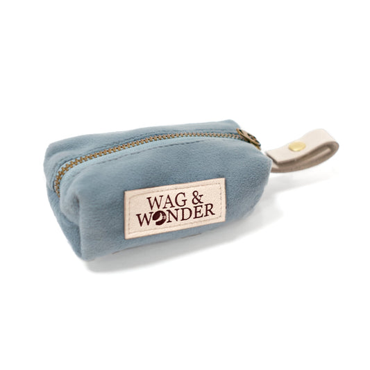 Light blue velvet waste bag holder with zipper pouch and WAG & WONDER patch