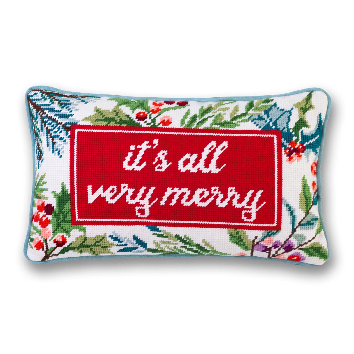 Needlepoint holiday throw pillow with red “It’s all very merry” banner on white