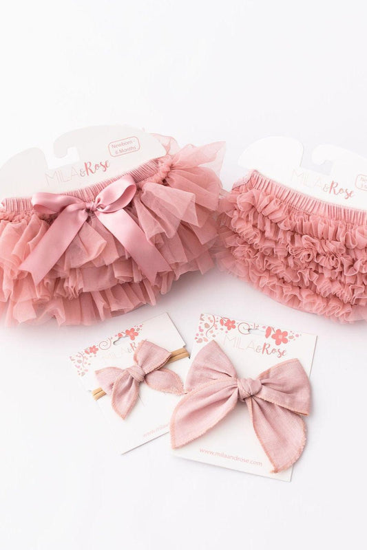 Pink ruffle tutu bloomer with bow sash and gathered elastic waistband