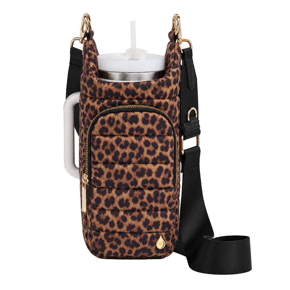 Leopard print tumbler handle bag with open-top holder and black crossbody strap