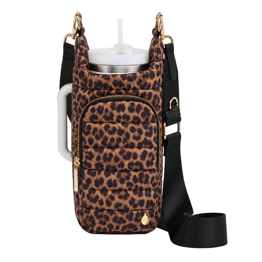 Leopard print tumbler handle bag with open-top holder and black crossbody strap