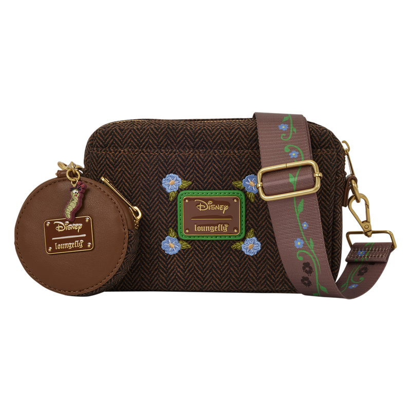 Back of the sling bag with brown chevron fabric, floral strap, and Loungefly plaque