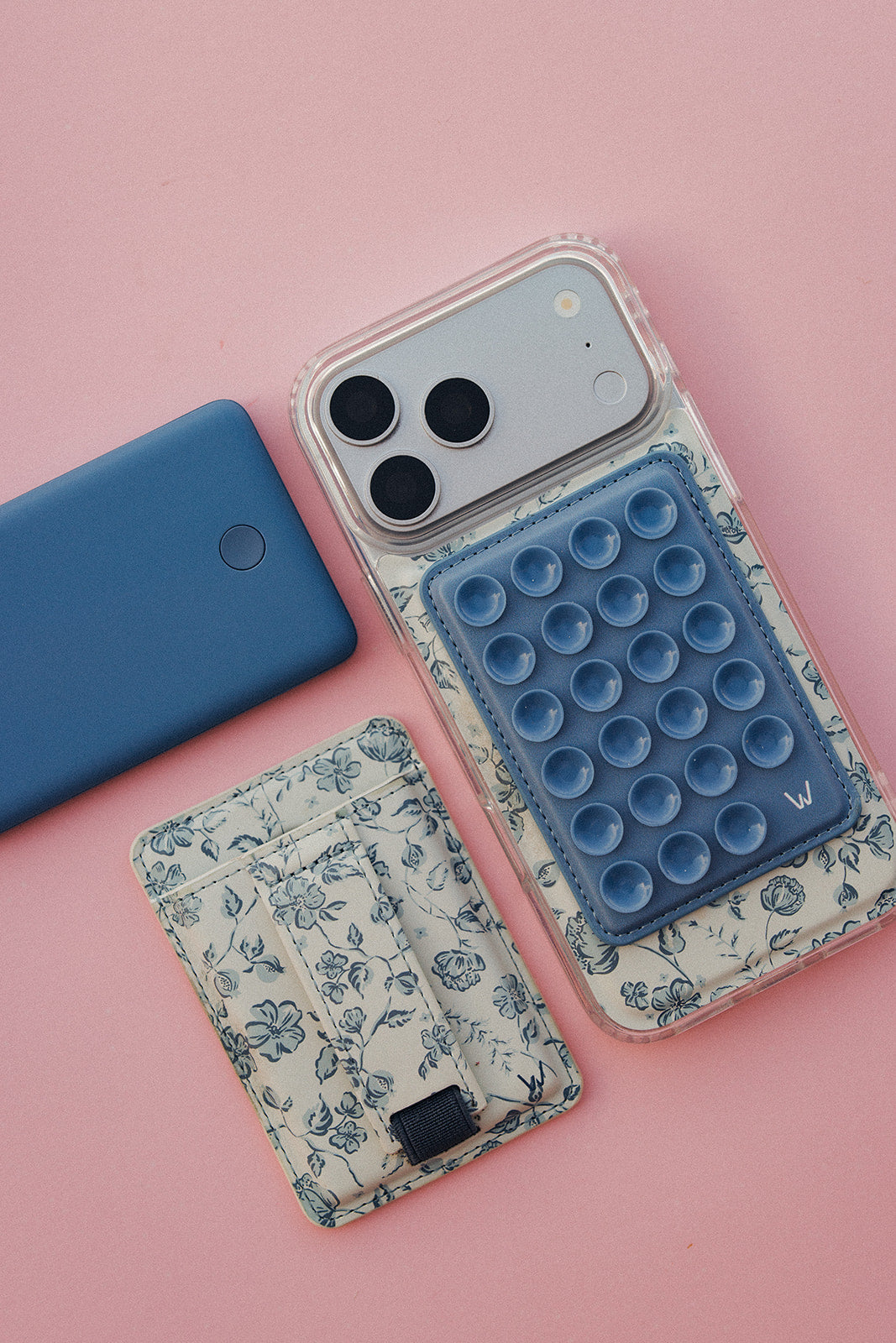 Set of floral and blue magnetic phone wallets with circular pop cover