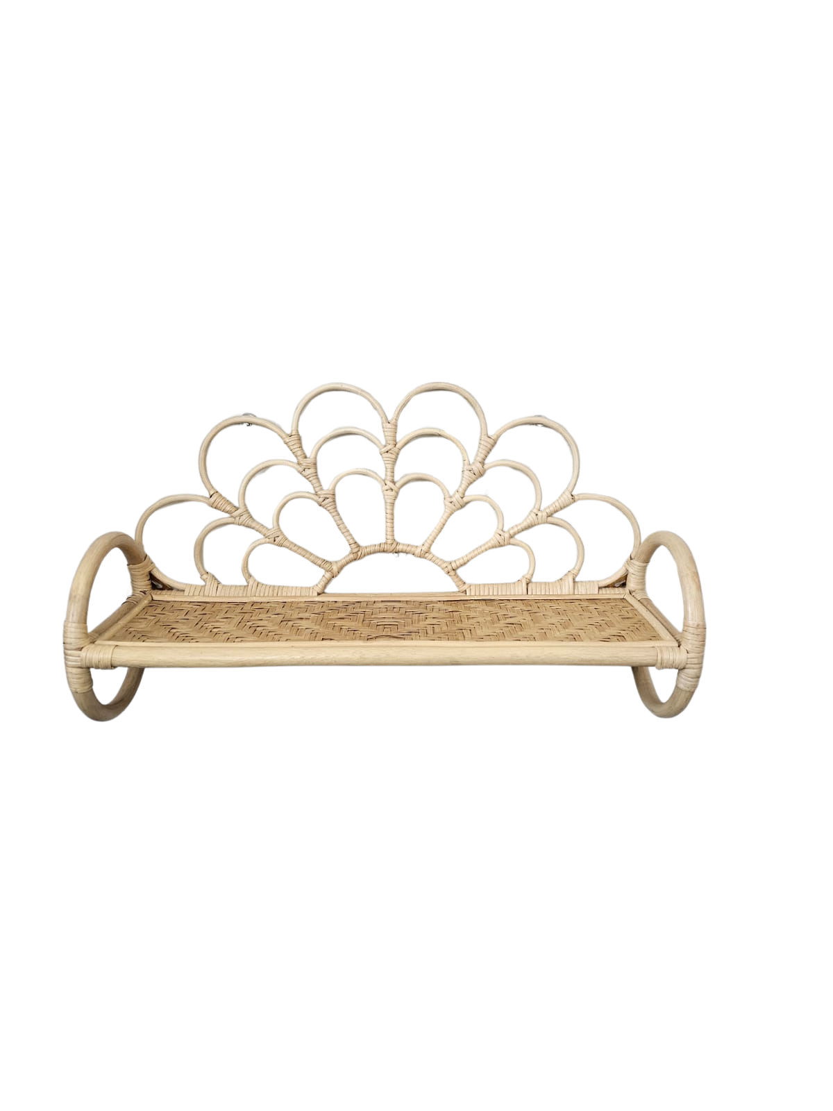 Natural rattan wall shelf with a sunburst looped back and woven tray.
