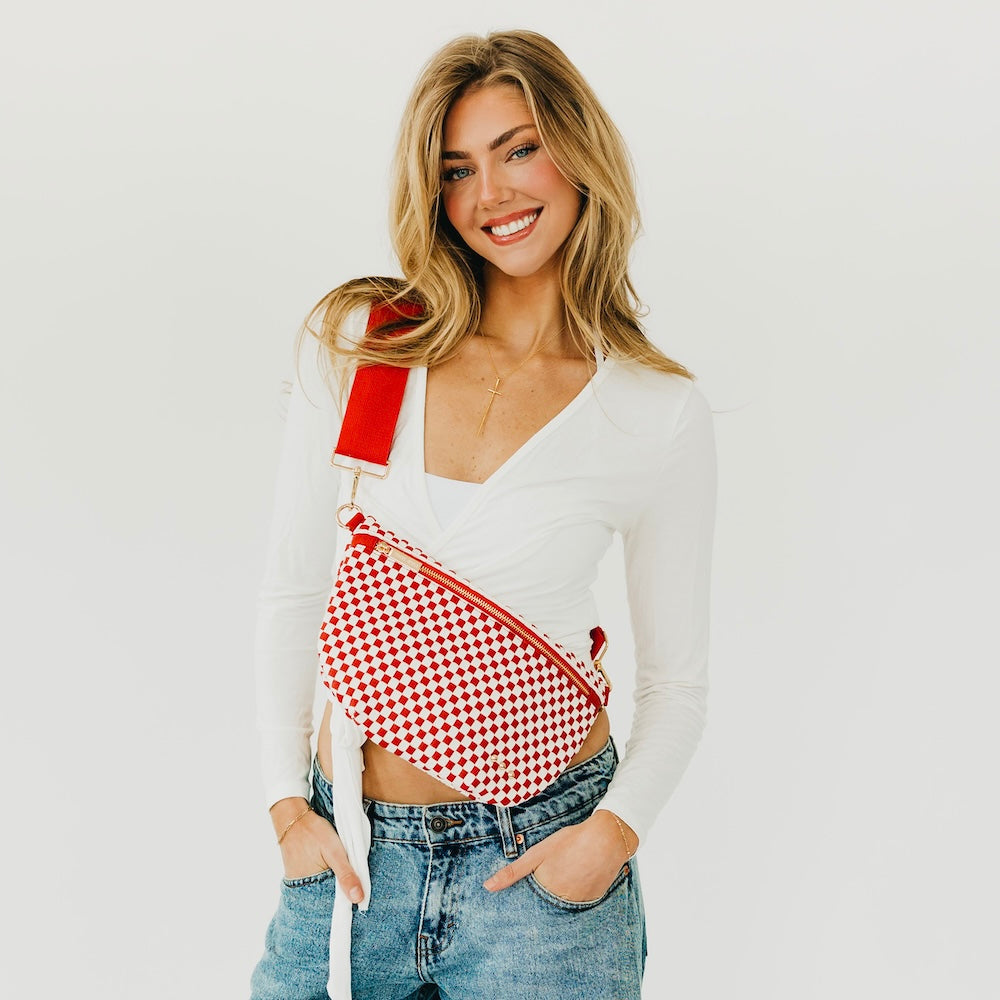 Red-and-white checkered woven bum bag with zipper and adjustable strap