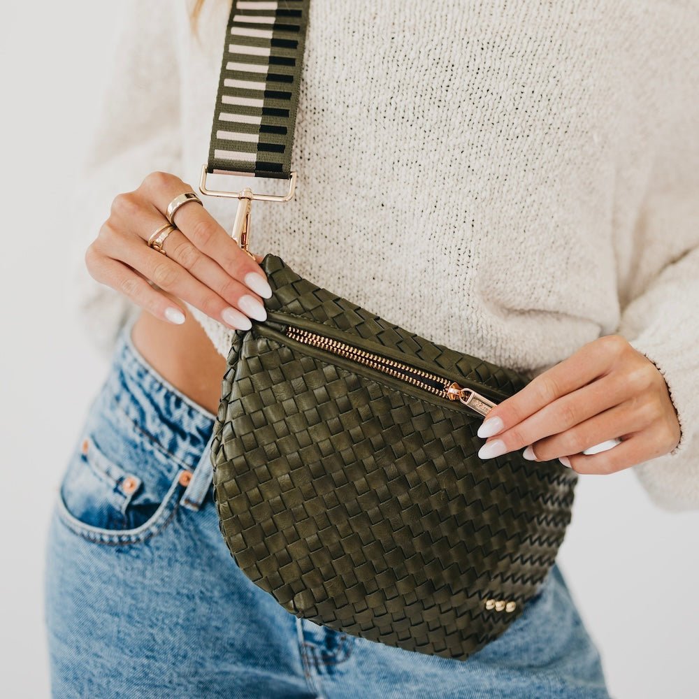 Olive woven bum bag with gold-tone zipper and adjustable crossbody strap.
