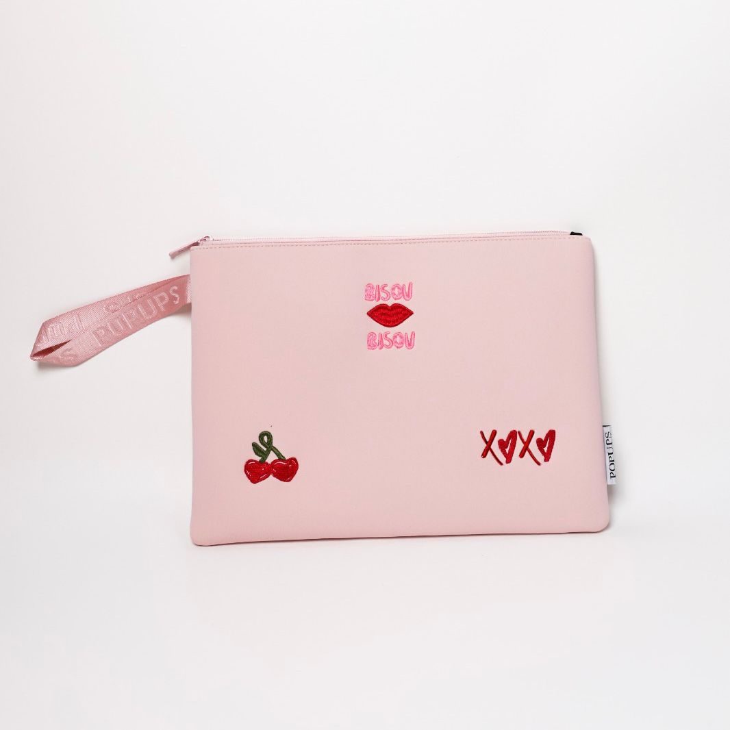 Pink zip laptop sleeve with heart and cherry embroidery on front
