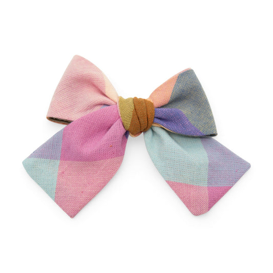 Petite plaid hair bow in pink, teal, and blue with a center knot