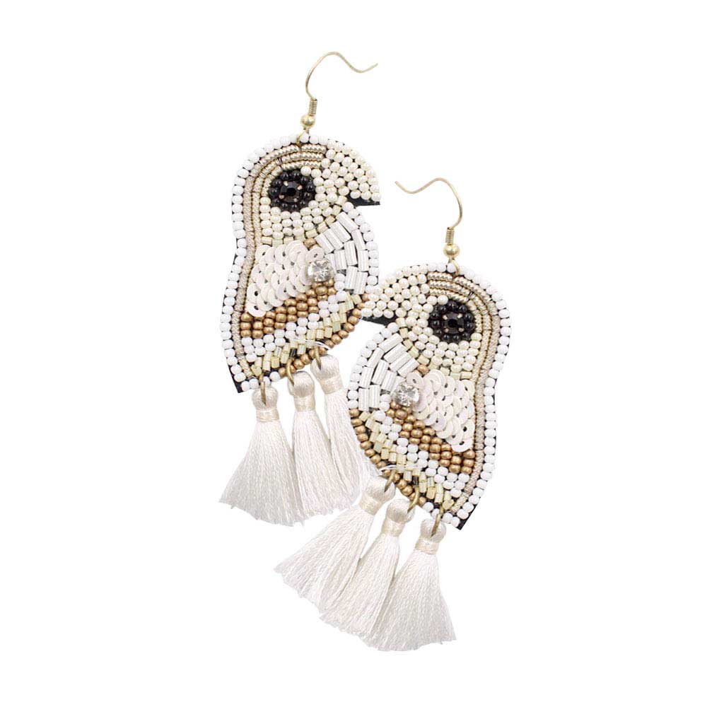 Parrot bead sequin tassel earrings, white beadwork with white tassel fringe.