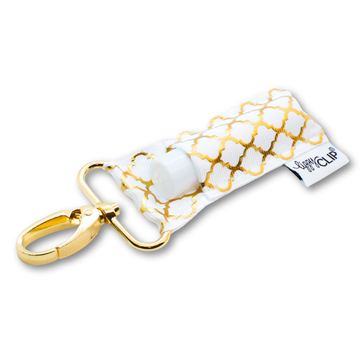 White lippyclip lip balm holder with gold quatrefoil pattern and gold keyring clasp