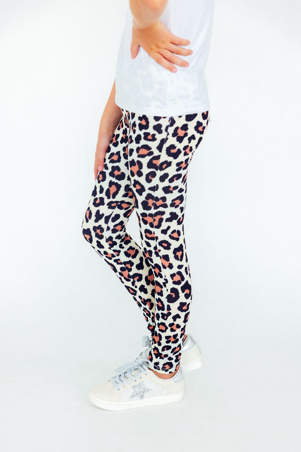 Leopard print leggings, full-length slim fit in cream with black and orange spots