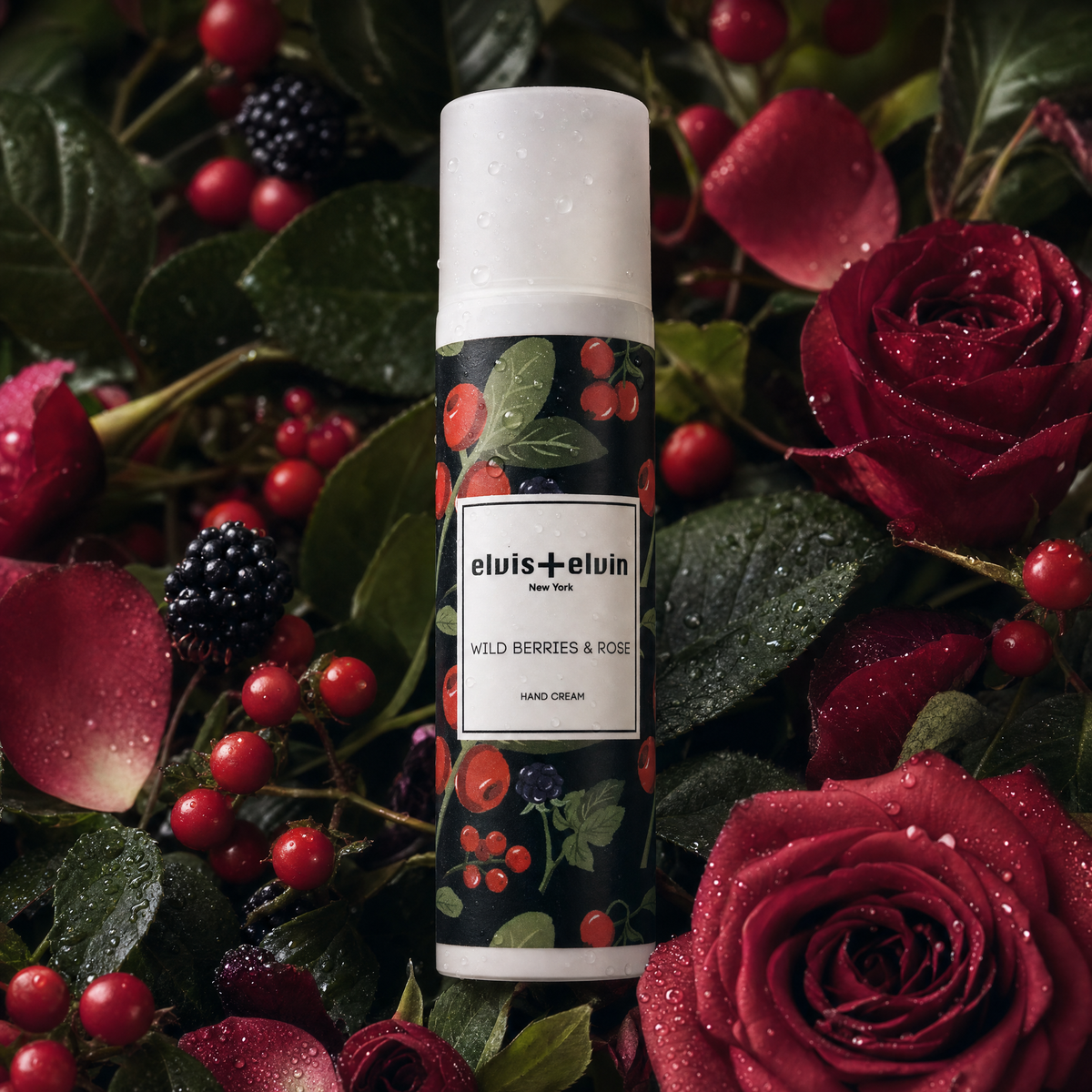 Hand cream bottle with green berry pattern and rose graphics, elvis+elvin label