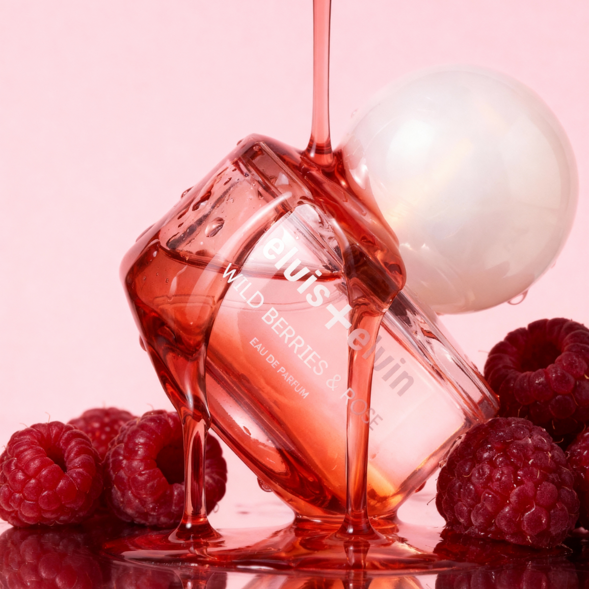 Wild Berries & Rose eau de parfum bottle with pink-tinted glass and berry accents