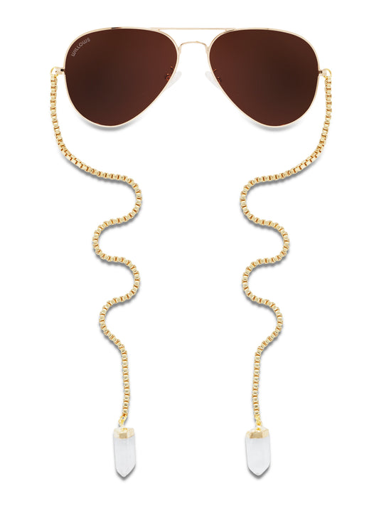 Gold-tone crystal drop earrings with aviator-style frames and clear dangle points