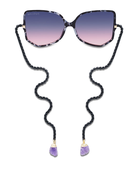 Purple-tinted oversized sunglasses with black beaded chain and purple dangling charms