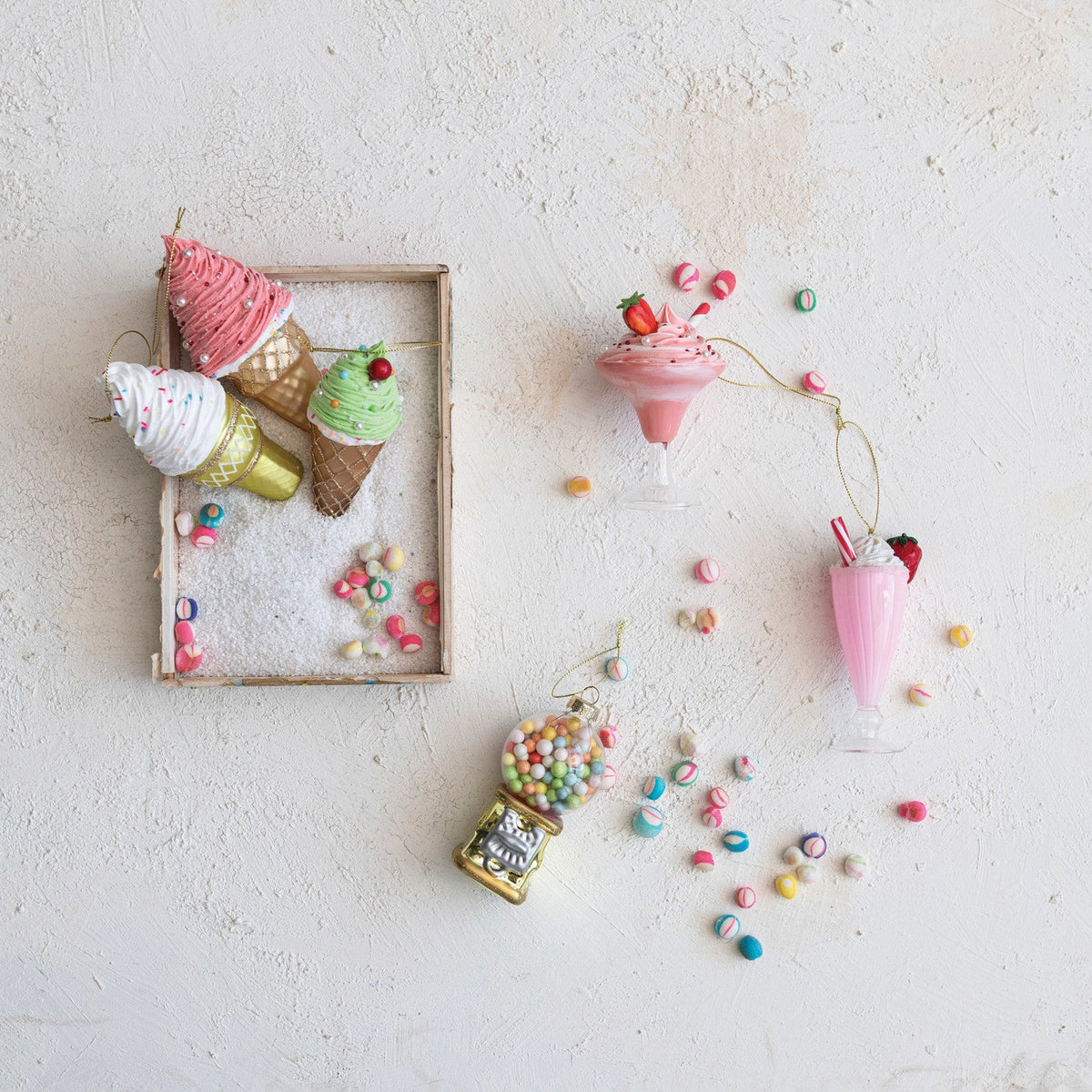 Ice cream cone ornament set with glitter swirls and bead details, hanging pink, green, and white
