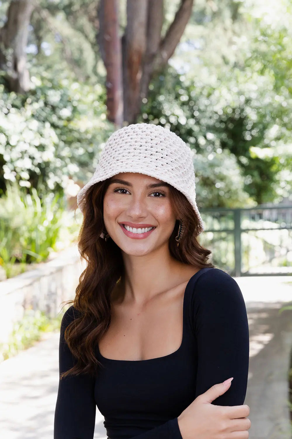 Natural handwoven crochet bucket hat with rounded crown and wide brim