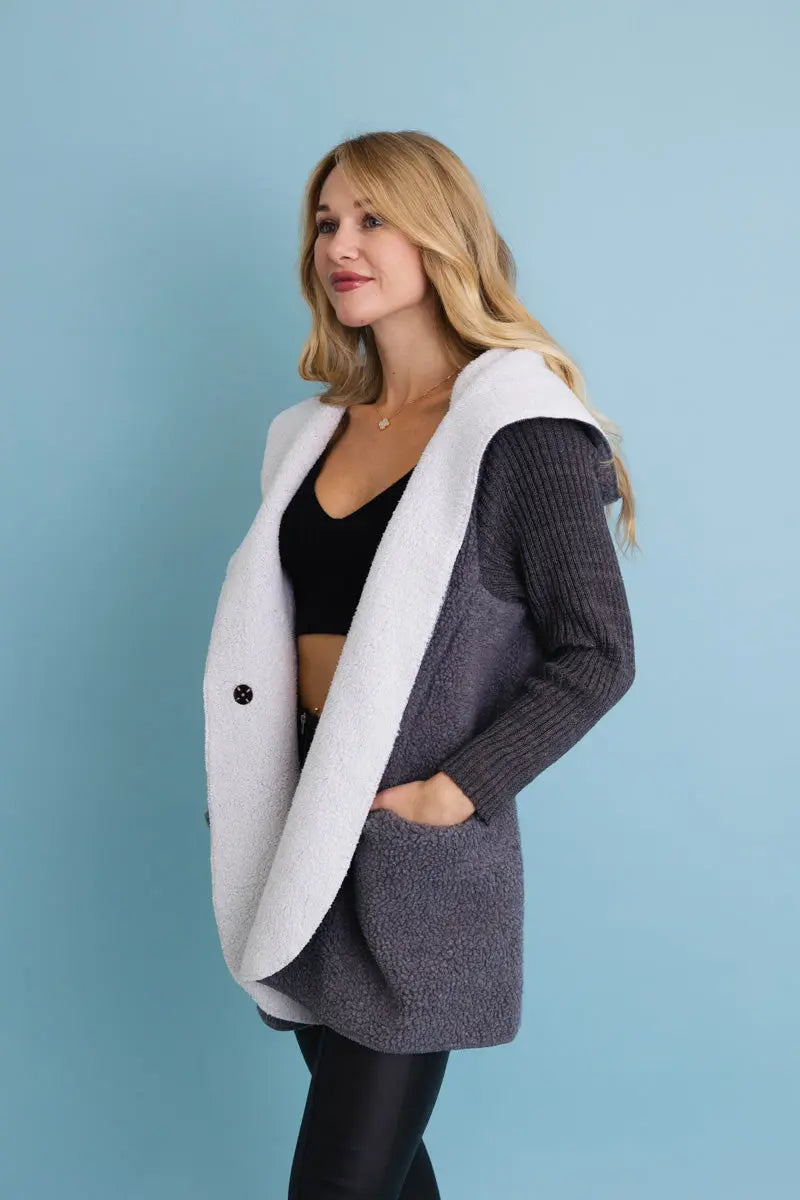 Gray sherpa hooded cardigan with contrast white hem, button detail, and side profile